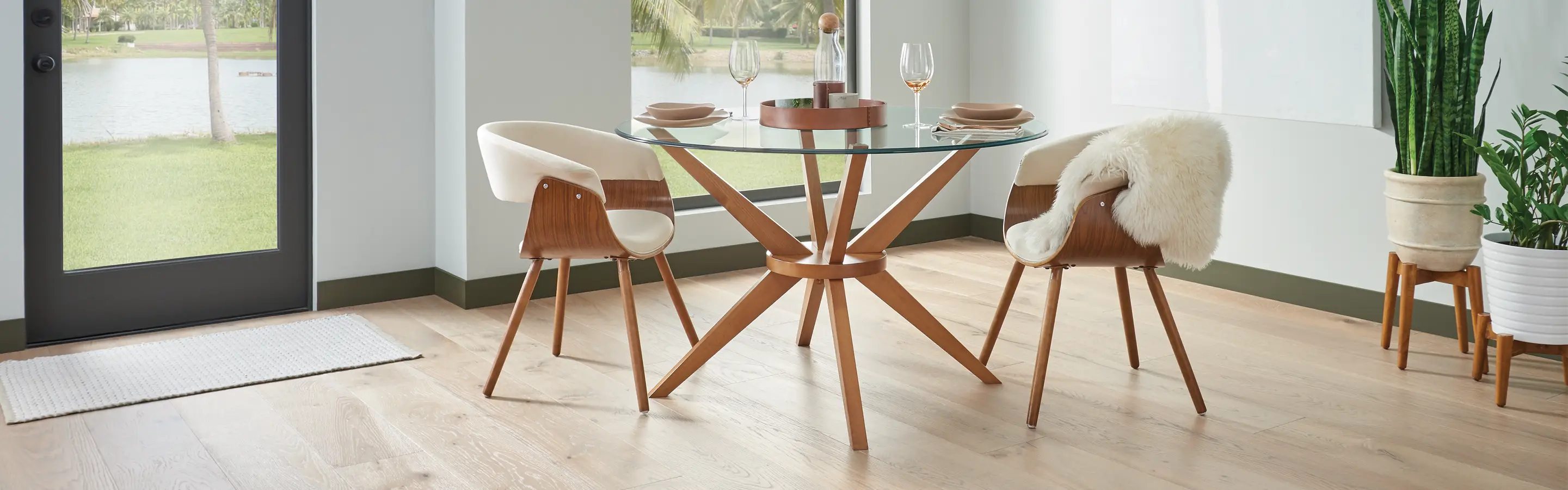 Light brown hardwood flooring in a modern dining room