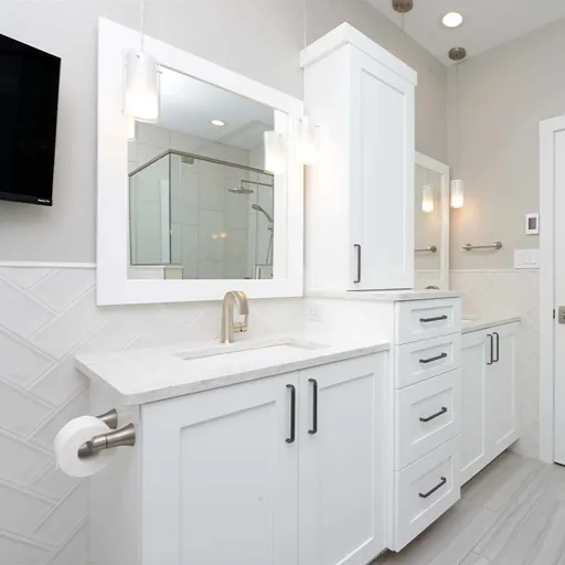 Hardwood look plank installation with white cabinets in ND