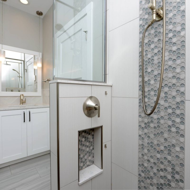 tile shower surround in bathroom